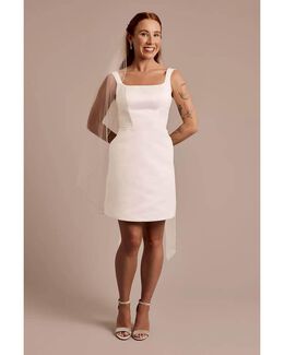 Vestido escote cuadrado y moño en espalda