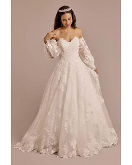 Vestido de novia con aplicaciones de encaje y mangas abullonadas