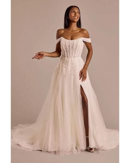 Vestido de novia con corset y aplicaciones de encaje