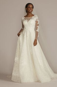 Vestido de novia princesa con mangas largas con aplicaciones de encaje