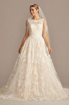 Vestido de novia princesa con escote ilusión y aplicaciones de encaje
