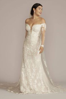 Vestido de novia sirena con mangas largas y hombros descubiertos